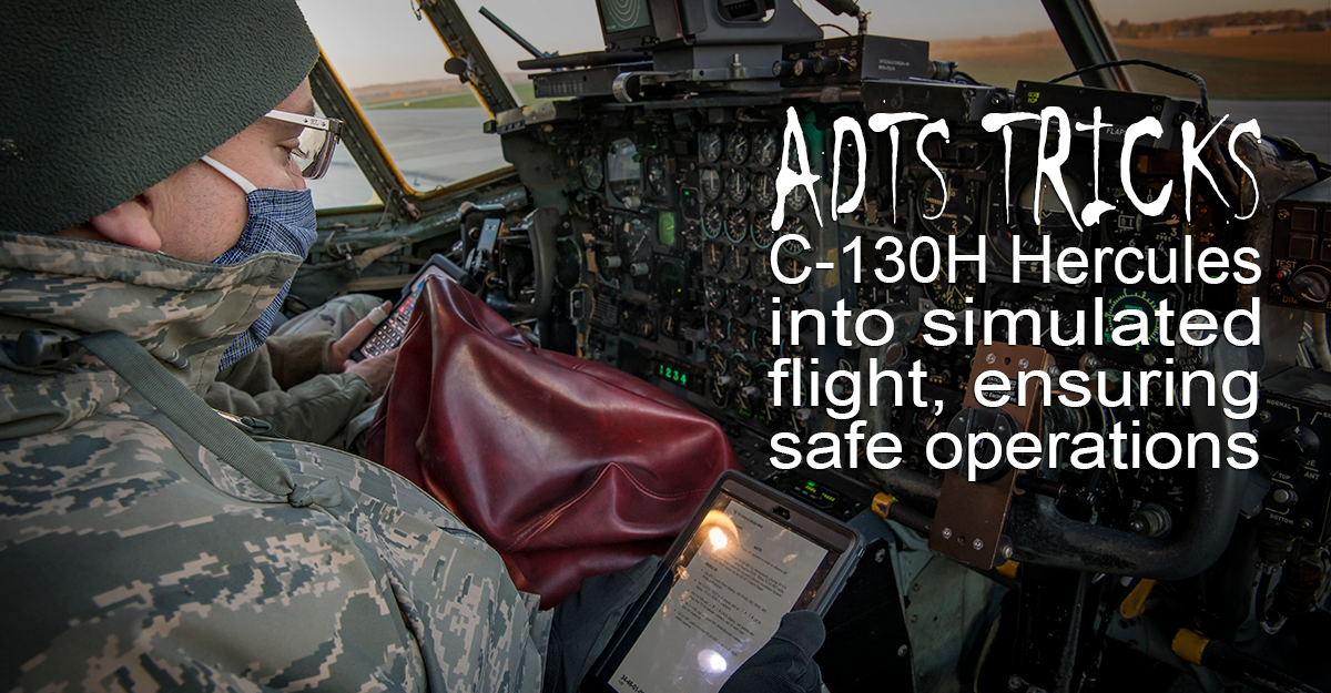Airmen in cockpit of C-130H.