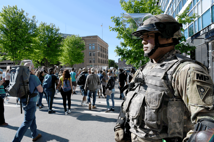 Cpl. James Tarver, an Ohio Army National Guard military police team leader, stands guard during ongoing protests May 31, 2020, in downtown Columbus, Ohio. Gov. Mike DeWine activated the Ohio National Guard to assist local law enforcement in Columbus and Cleveland with providing safety and protection to the community, while ensuring people’s right to gather and demonstrate peacefully.
