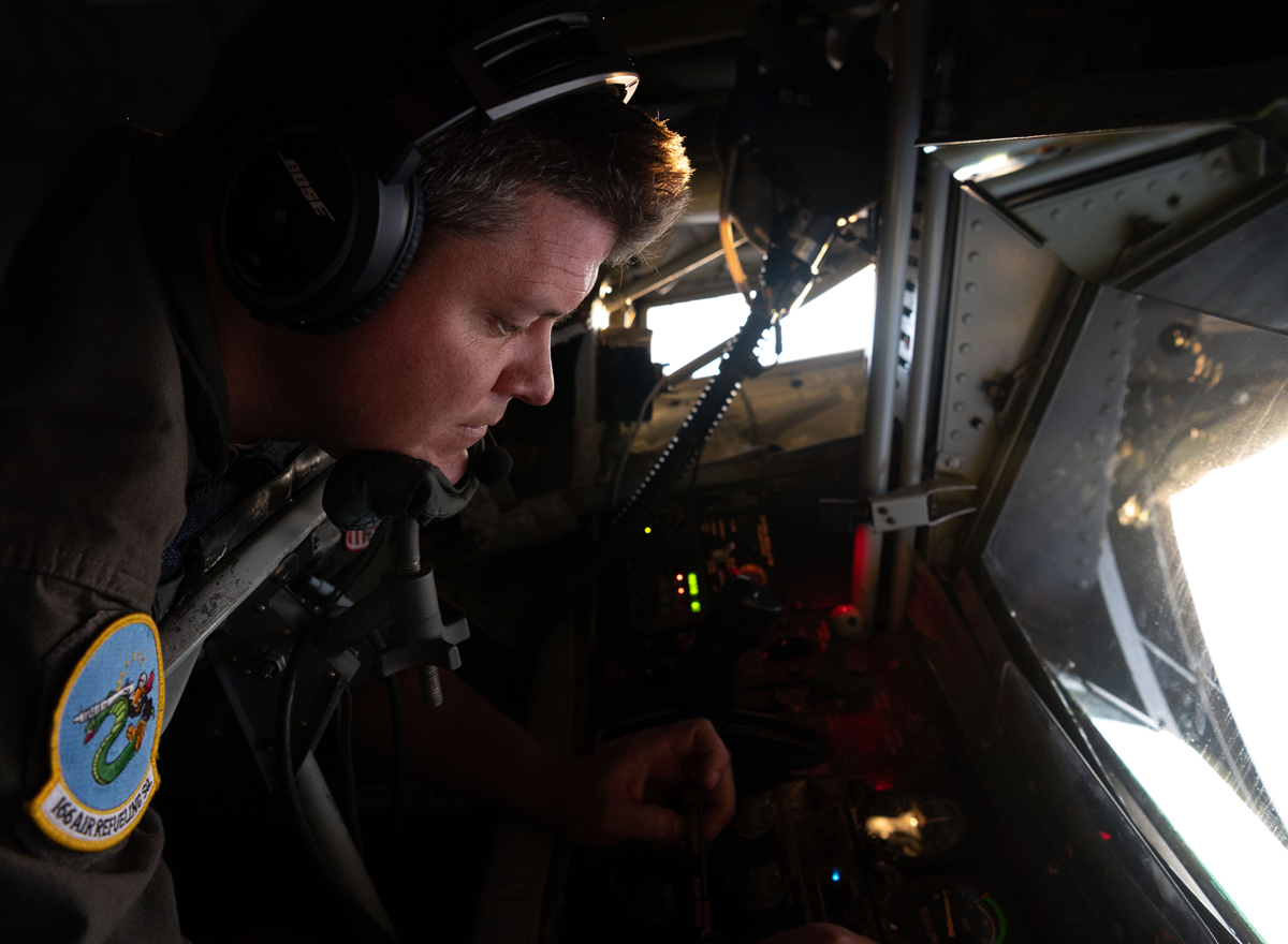 Instructor operating boom.