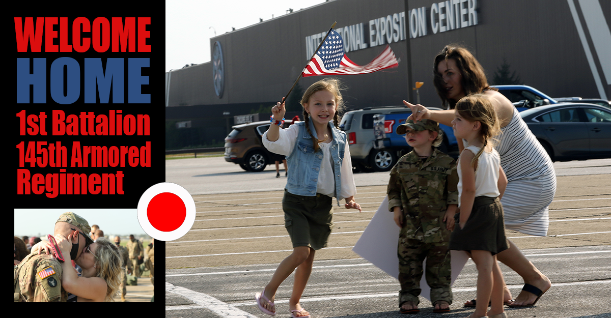 Maylee-Jo Shonk (left) runs around waving an American flag as Marissa Shonk points toward Capt. Michael Shonk, a member of the Ohio Army National Guard’s 1st Battalion, 145th Armored Regiment, Sept. 25, 2020, at the I-X Center in Cleveland. Soldiers of the 1-145th returned to family and friends after more than a yearlong deployment to the Middle East in support of Operation Spartan Shield.
