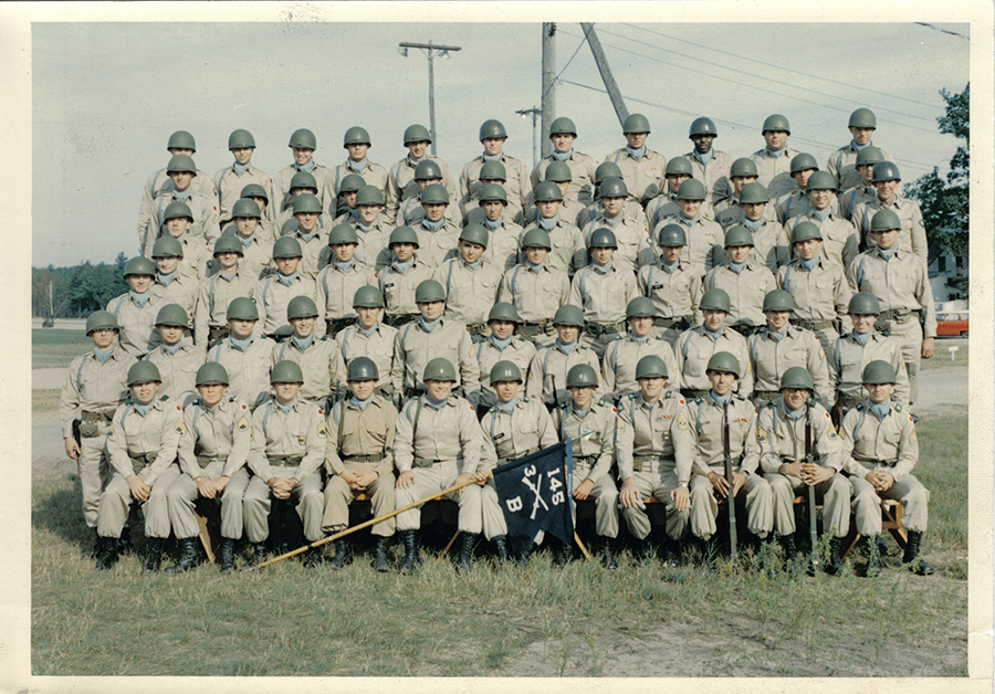 Color photo from 1965 of Soldiers in rows fro group photo.