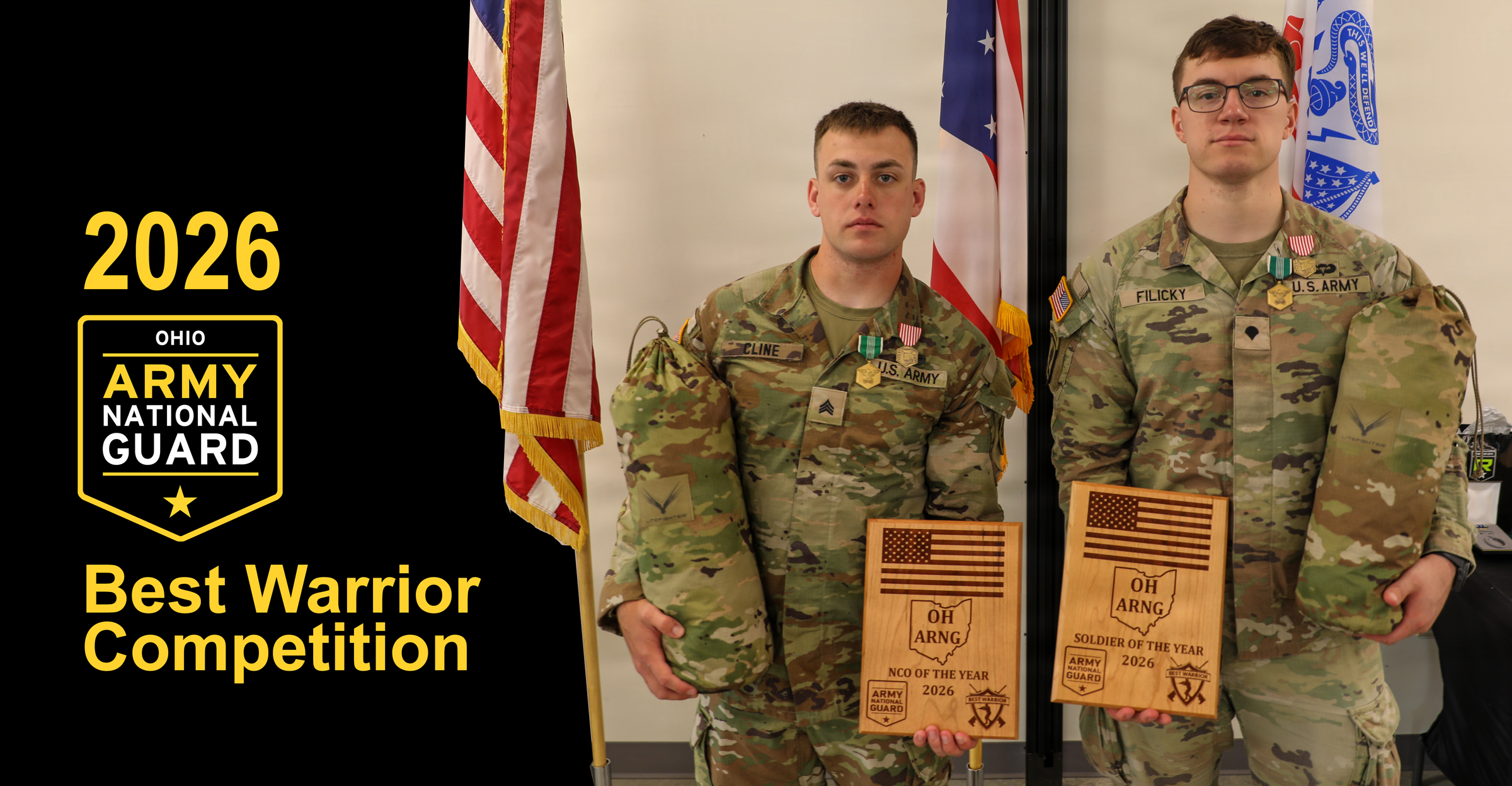 Best Warrior Competition winners stand holding awards