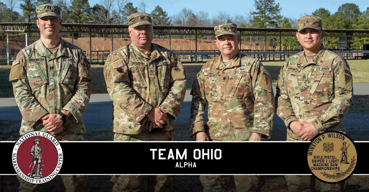 4 Soldiers stand in uniform for photo. National Marksmanship seal and Winston P. Wilson Rifle, Pistol, Sniper & Light Machine gun Championships seal super imposed. Labeled Team Ohio, Alpha.