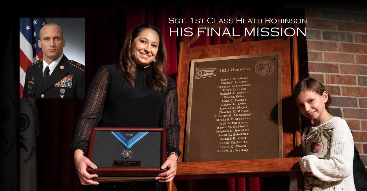 Danielle and Brielle Robinson stand next to 2023 Veterans Hall of Fame honorees