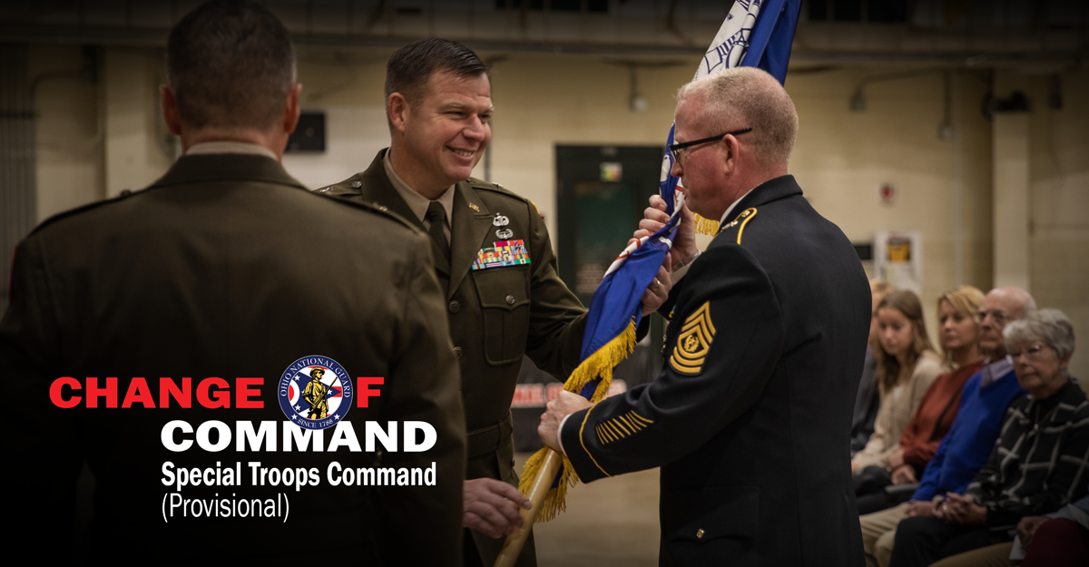 Brig. Gen. Andrew B. Stone passes the Army Field flag to Command Sgt. Maj. William Adams, STC command sergeant major.