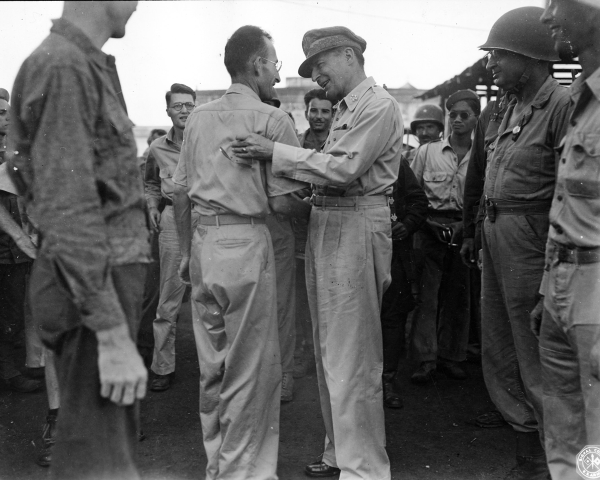 1945 photo of Maj. Joseph L. Chabot, shaking hands with Gen. Douglas MacArthur.