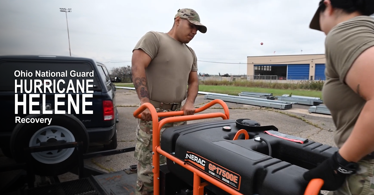 Airmen loading a trailer.