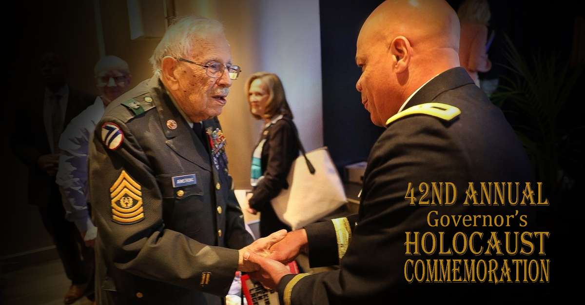 Army veteran shakes hands with Mag. Gen Harris.