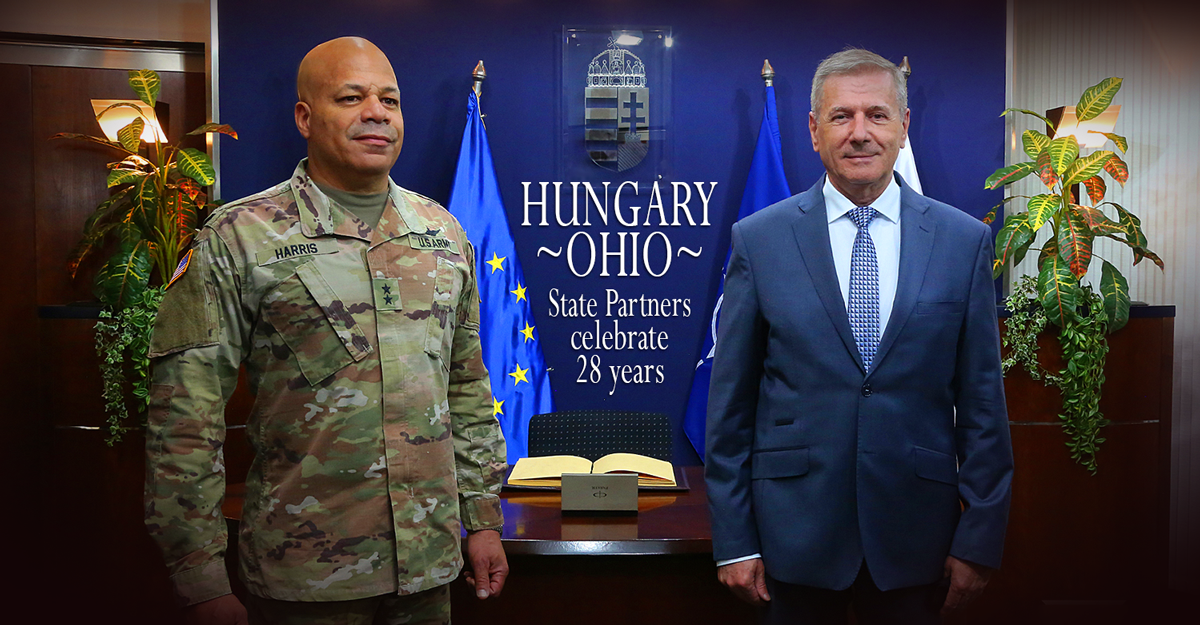 Maj. Gen. John C. Harris Jr. stands with Hungarian Minister of Defence Tibor Benkő 
