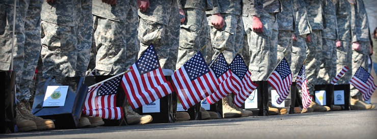 Soldiers of the 437th Military Police Battalion stand in formation following the unit's call to duty ceremony April 5, 2013, in Franklin, Ohio. 