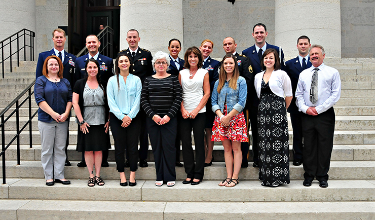Airmen, Soldier NCO of the Year and guests on steps of the Ohio Statehouse in Columbus