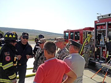 Firefighters from the Ohio Army National Guard’s 5694th Engineer Detachment participate in a training class with firefighters from various European countries' militaries
