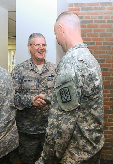 Maj. Gen. Mark E. Bartman (left), Ohio adjutant general, welcomes home Soldiers.