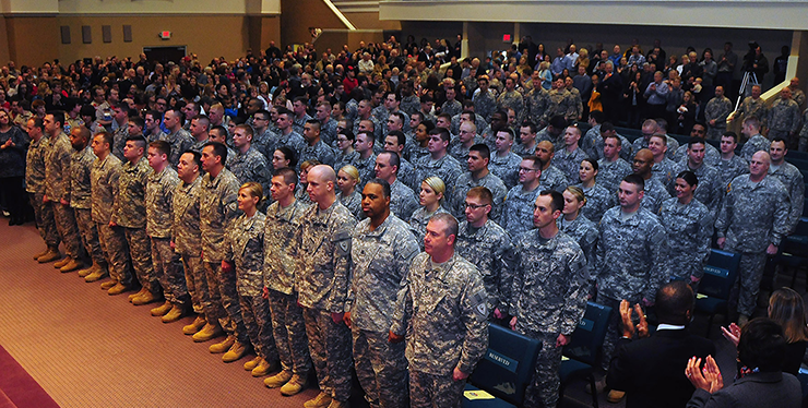 About 150 Soldiers from the Ohio Army National Guard's 1st Battalion, 137th Aviation Regiment stand at attention during the call to duty ceremony