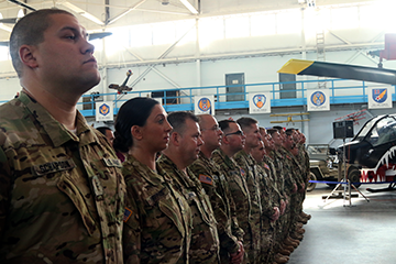Soldiers of Company B, 3rd Battalion, 238th Aviation Regiment, stand at attention during the unit’s call to duty ceremony.