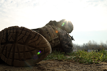 A Soldier conducts a “stress shoot” during the 73rd Troop Command Best Warrior Competition.