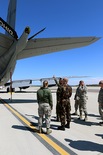 Command Sgt. Maj. István Kriston (second from left), command sergeant major of the Hungarian Defence Forces, checks out a KC-135R Stratotanker.