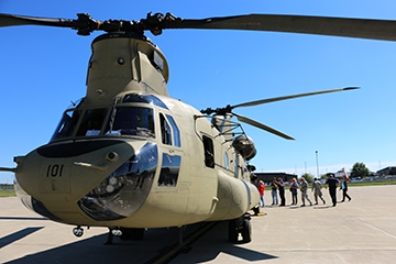 Attendees of an Ohio National Guard Joint Employer Event board a CH-47 Chinook helicopter.
