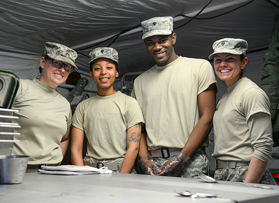 Sgt. Mckinzie Baker (from left), Spc. Deshaunna Gee, Spc. James White Jr. and Spc. Nancy Corsmeier, culinary specialists with Company D, 128th Support Battalion in Hamilton, Ohio.