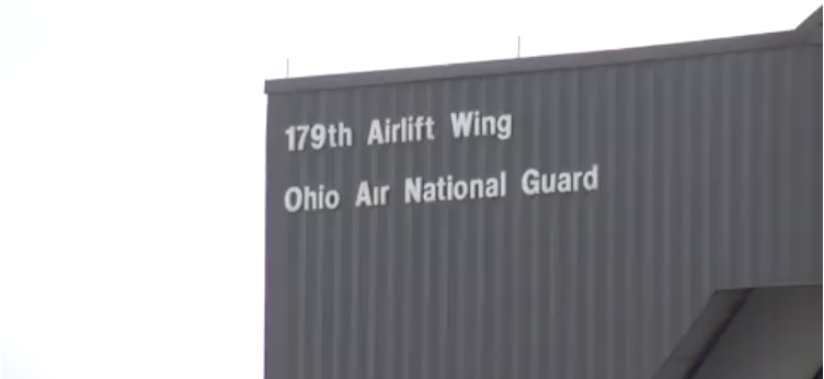 179th Airlift Wing marquee on building.