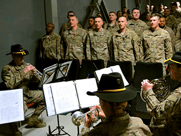Soldiers assigned to the 204th Engineer Detachment sing “The Engineer Song” at their color casing ceremony.