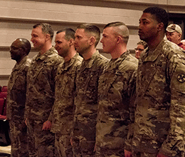 Soldiers of the 204th Engineer Detachment are recognized with applause during the unit’s welcome home ceremony.