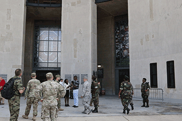 Members of the Serbian and Angolan Armed Forces tour Ohio Stadium with members of the Ohio National Guard.