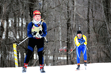 Spc. Lisa Roberts (left) competes in the relay race event March 7, 2017. 
