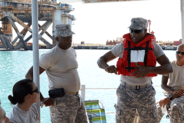 Sgt. Carlos J. Seguinot conducts a safety brief while on an Army landing craft.