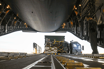 View of Blackhawk being loaded onto C-17 Globemaster III from inside.