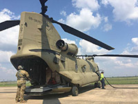 Buckeye II, a Chinook helicopter belonging to the Ohio Army National Guard, on Monday carried food and water for the people of Kountze, Texas.
