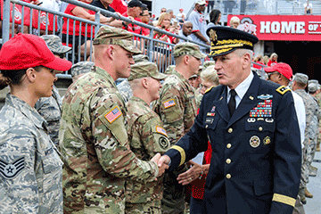 Lt. Gen. John M. Murray, U.S. Army deputy chief of Staff, G-8, speaks with Soldiers and Airmen before kickoff.