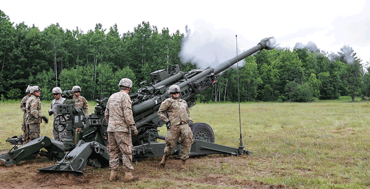 Soldiers with Battery C, 1st Battalion, 134th Field Artillery Regiment fire the M777 howitzer during a live-fire exercise.