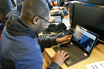 Students at computer.