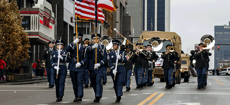 Head on view of Members of the Ohio National Guard march down Broad Street.