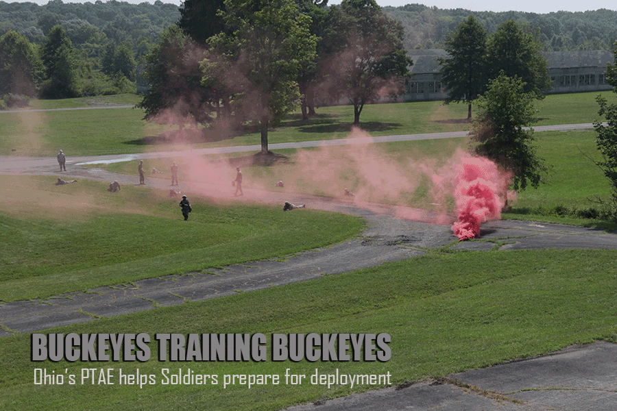 Soldiers practice off-road under cover of pink smoke screen