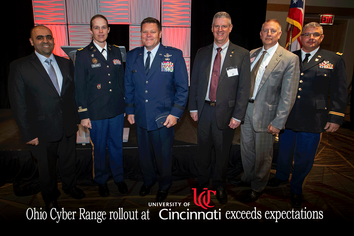 Representatives from the Ohio Adjutant General’s Department and the University of Cincinnati stand for a photo June 19, 2019, during the university’s Cybersecurity Education Symposium to celebrate the completion of the second phase of the rollout of the Ohio Cyber Range. The next phase of the OCR rollout will see the power of the computing system at UC doubled and an identical system installed at the University of Akron.