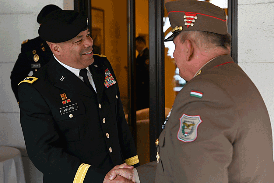 Maj. Gen. John C. Harris Jr. shakes hands with shakes hands with the director of the Hungarian Defence Forces Command Directorate for Training.