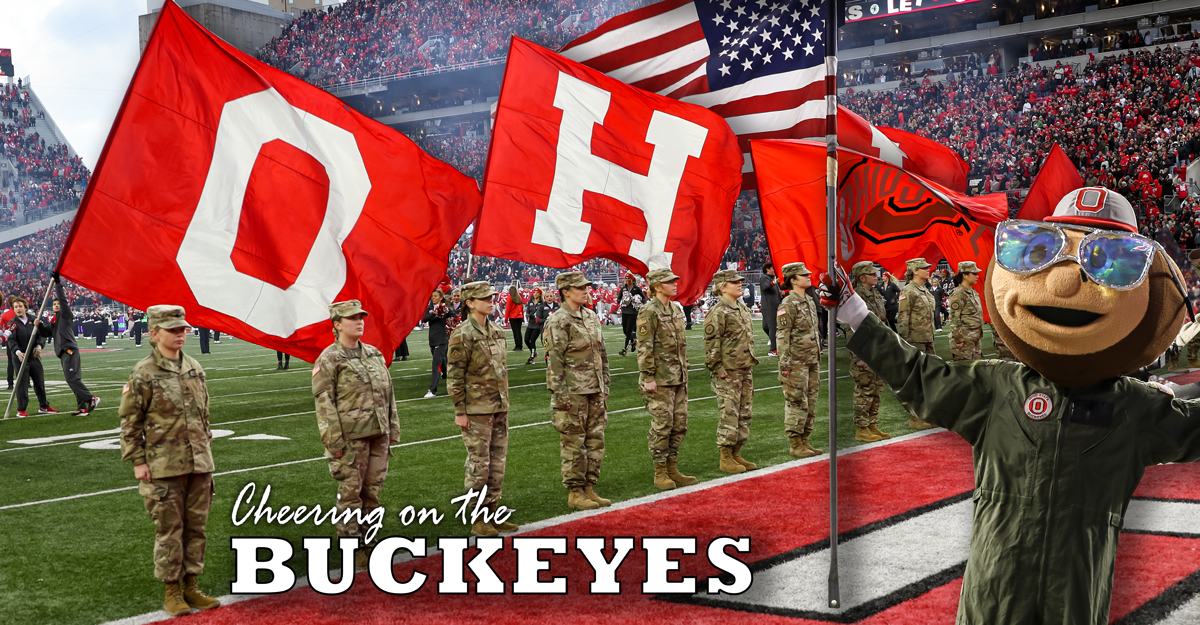 Guard Members on football field as O H I O flags are held behind them- BRUTUS superimposed.