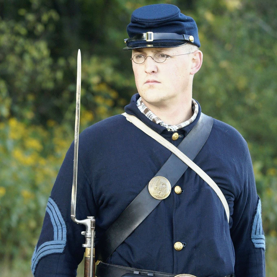 Portraying a regimental sergeant major at Civil War reenactment near Richmond, Va. in 2014. Mann was born into reenacting in 1977; his parents were active Revolutionary War reenactors during the American Bicentennial, and he took up the hobby in the 1990s during the boom in Civil War reenacting. 