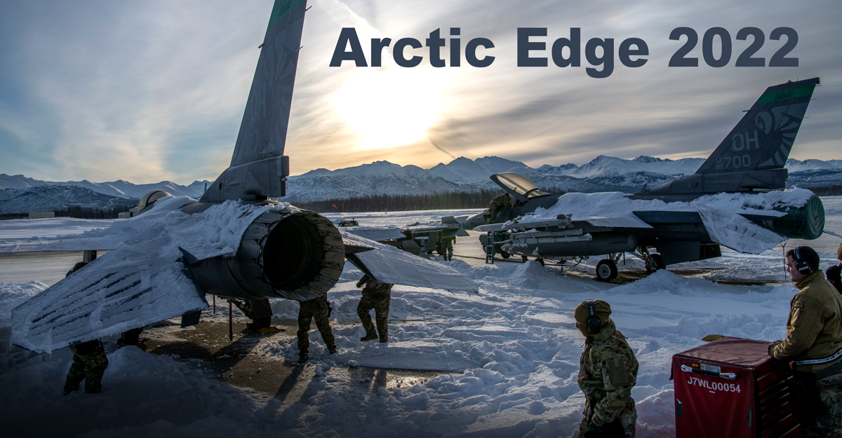 F-16s on snow-covered tarmac in the Arctic.
