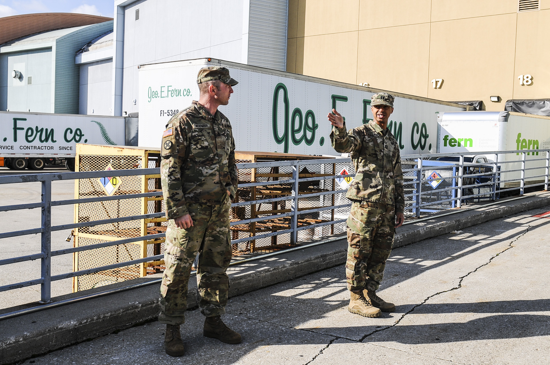 Soldiers standing on loading docks.