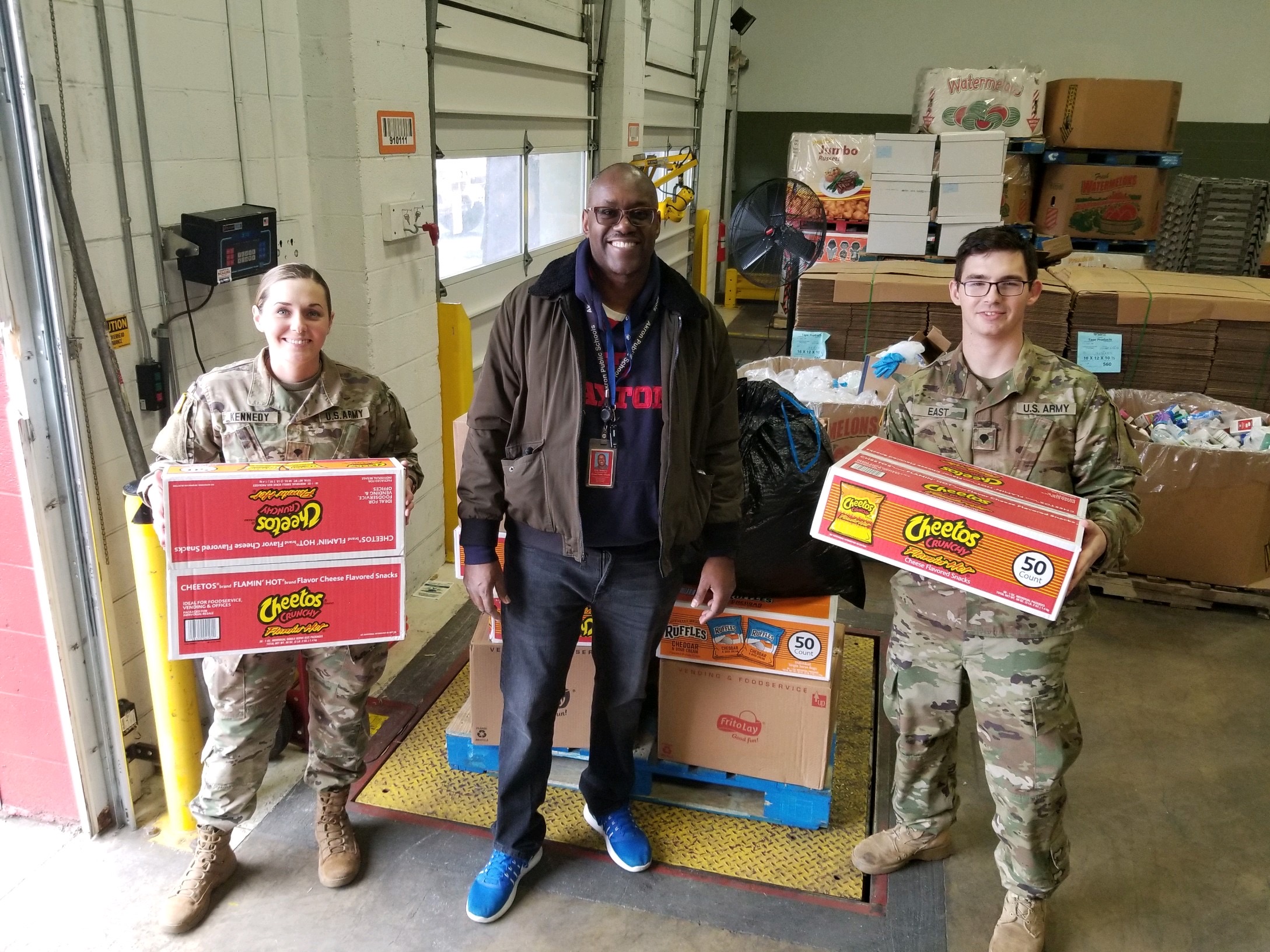 Soldiers receive donations from Akron schools.